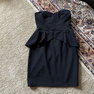 Ruffle hip strapless little black dress